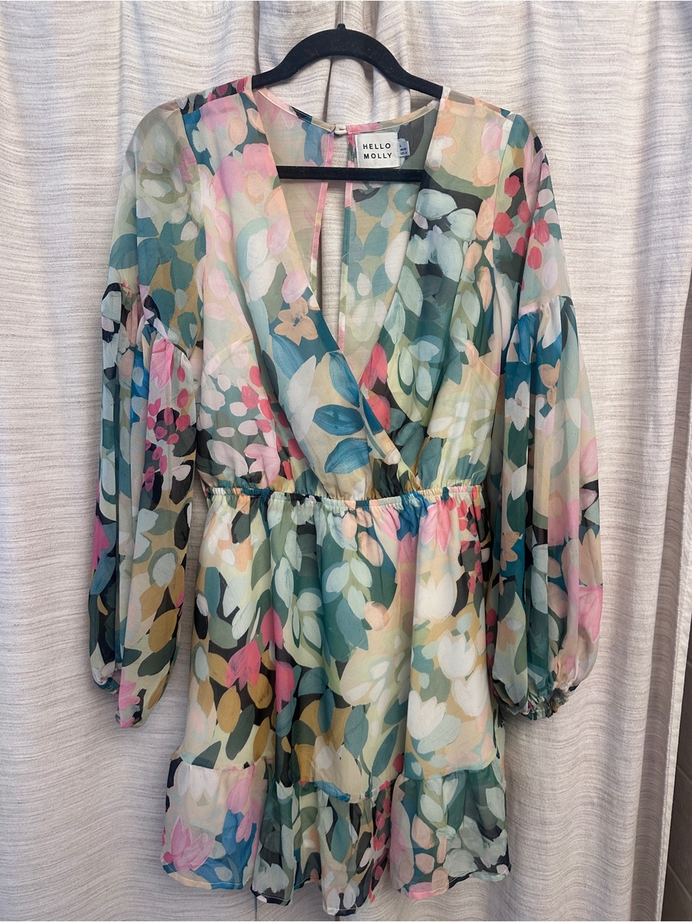 Beautiful colorful mini dress with sleeves